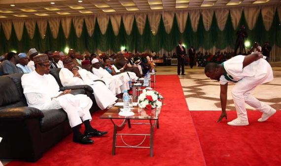 Photo-of-Dare-Art-Alade-Prostrating-Before-Buhari-Lai-Mohammed-Sparks-Reactions