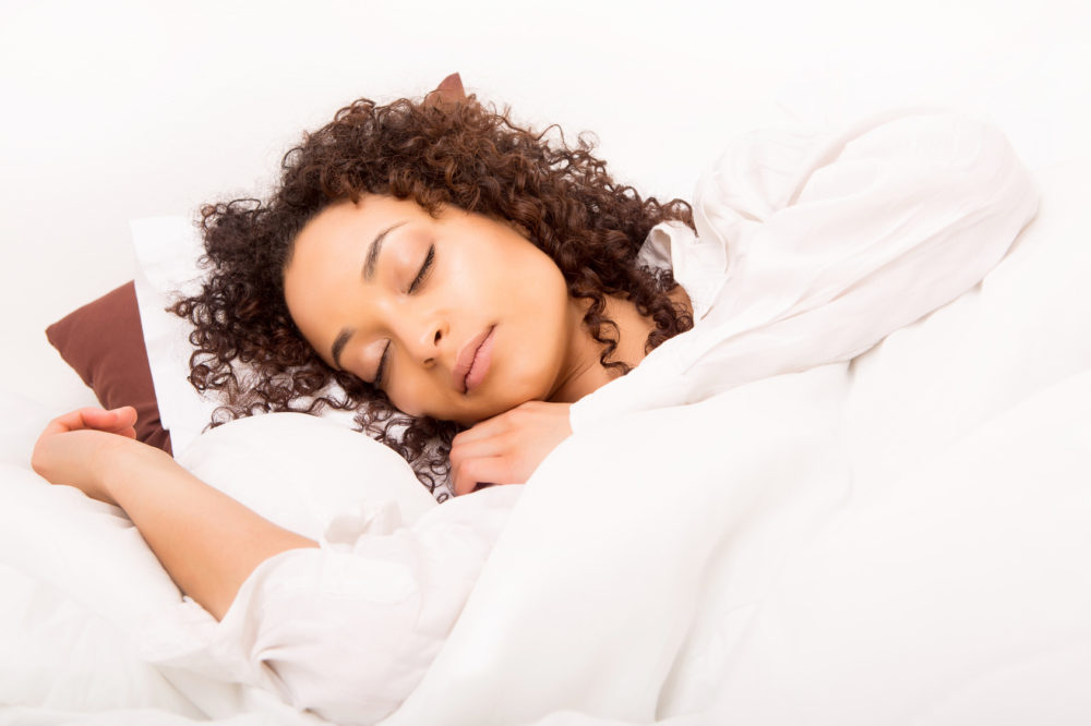 African woman slepping in bed